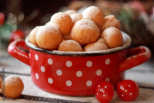 Fritule - Croatian mini doughnuts. Selective focus photo