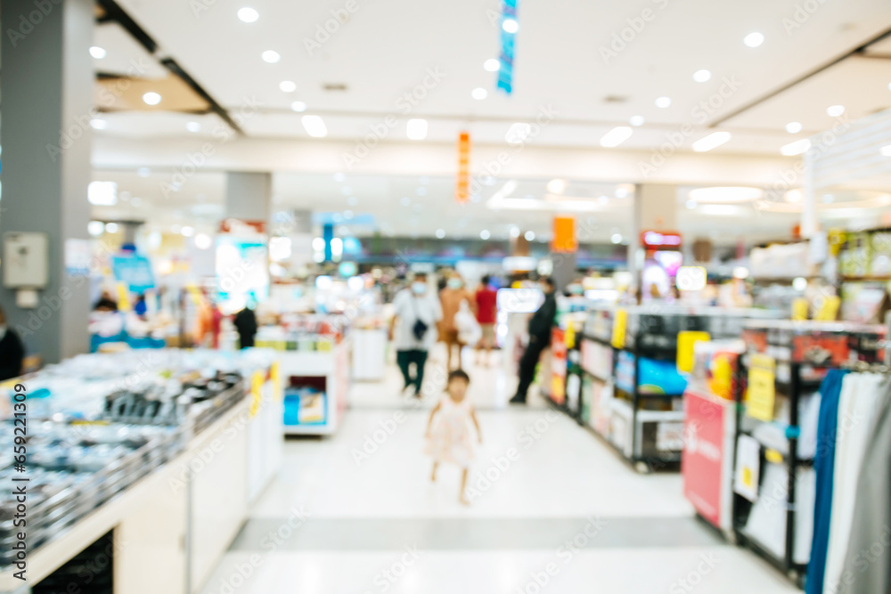 Abstract blurred of people in shopping mall of department store for background