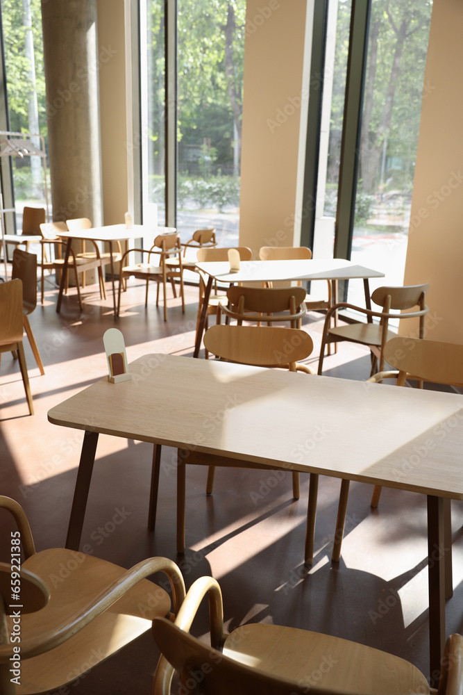Fototapeta premium Modern cafe with stylish furniture. Interior design