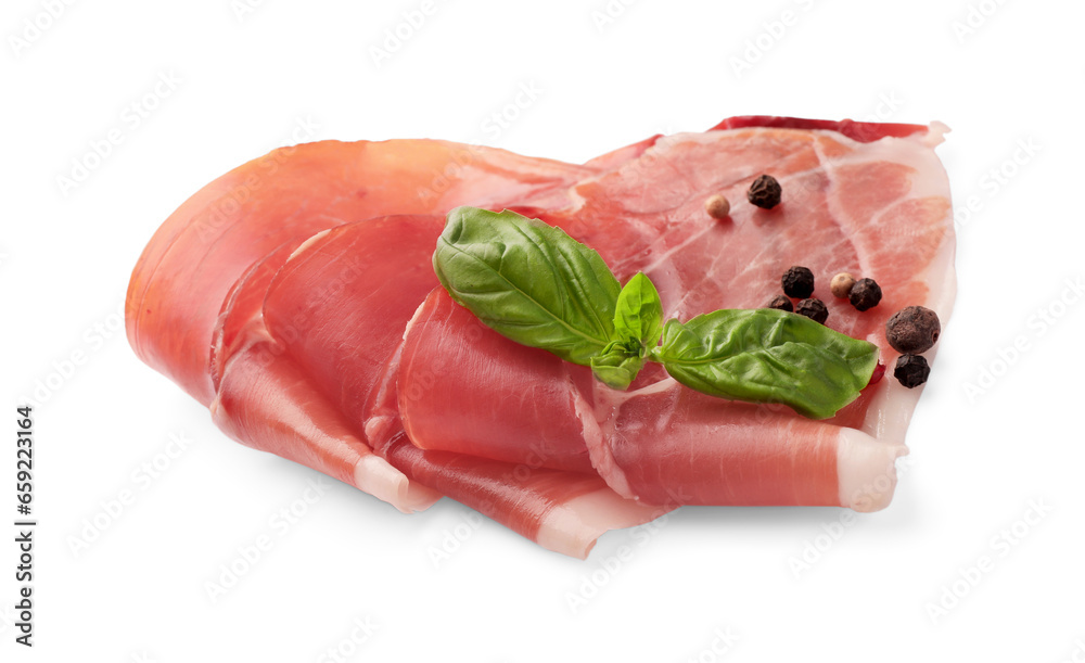 Slices of delicious jamon, spices and basil isolated on white