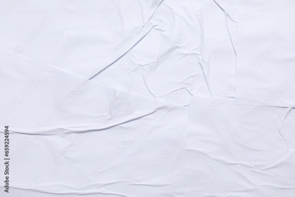 Obraz premium Texture of white creased paper as background, top view. Wall poster