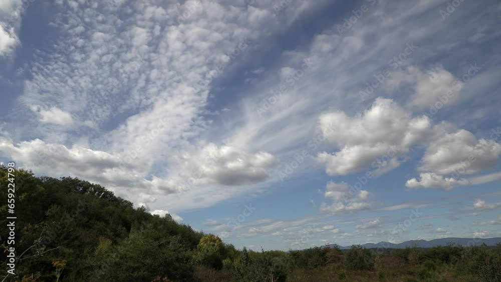 Time Lapse of dramatic clouds over a valley