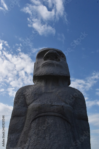 Sapporo Japan October 1 2023 The gorgeous huge stone Moai statue with the clear blue sky at the Takino Reien Makomanai