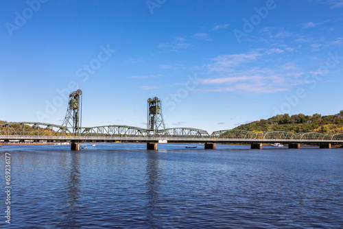 Historic Stillwater Lift Bridge over the Saint Croix River in downtown Stillwater Minnesota with Wisconsin on the distant shore