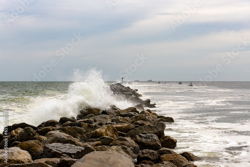 waves breaking on the rocks © Rican Thai Family