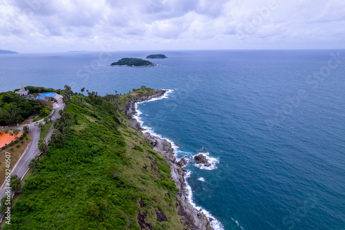 Aerial view of curve road along the seashore at Phuket Thailand, Beautiful seacoast view at open sea in summer season, Nature Environment and Travel background