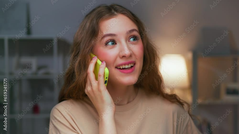 Portrait of Young Woman Talking on Smart Phone Close Up. Cute Happy Person Working Online at Home and Calling on Mobile Smartphone Device. Leisure Fun of One Smiling Female Speaking on Digital Gadget Portrait of Young Woman Talking on Smart Phone Close Up. Cute Happy Person Working Online at Home and Calling on Mobile Smartphone Device. Leisure Fun of One Smiling Female Speaking on Digital Gadget