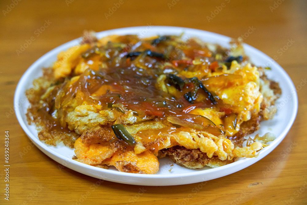 A delicious Chinese home-cooked dish, fried eggs with five fillets A delicious Chinese home-cooked dish, fried eggs with five fillets