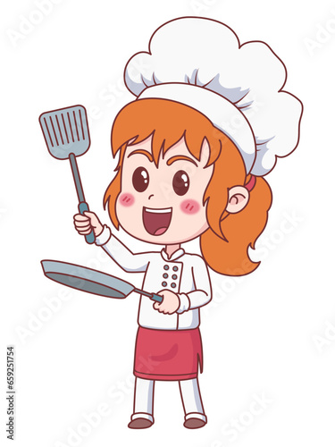 Happy little cook with pan and spatula in hands