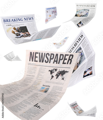 Many flying newspapers on white background photo