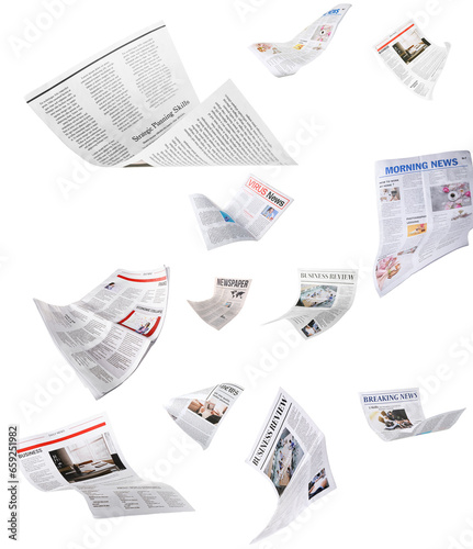 Many flying newspapers on white background