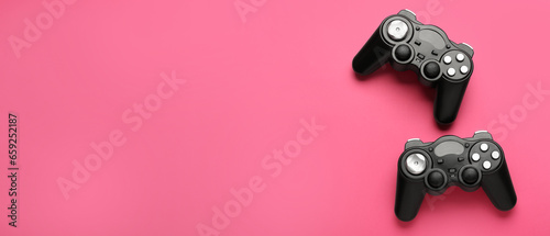 Modern controllers on pink ...