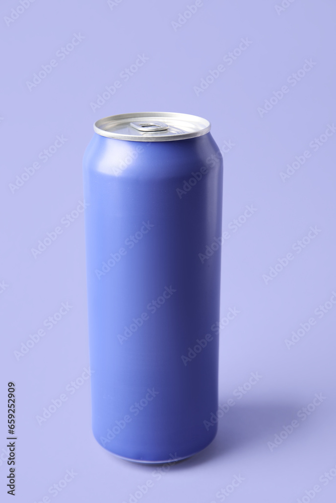 Can of fresh soda on lilac background Can of fresh soda on lilac background