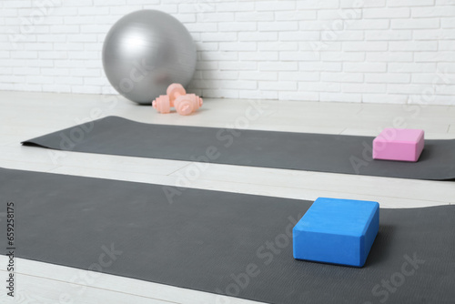 Home gym setup with yoga ma...