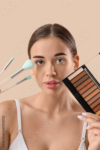 Young woman with decorative...