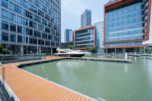 Photography financial district buildings of shanghai  in sunny day and the yacht docked at t