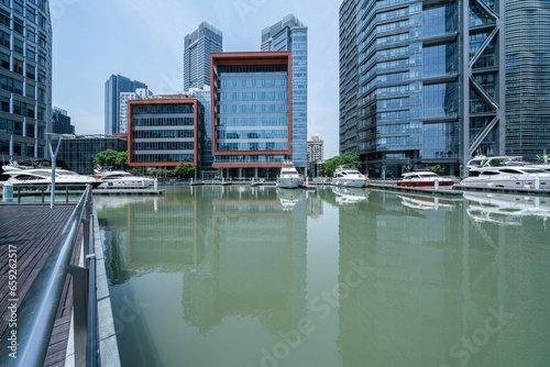 Photography financial district buildings of shanghai  in sunny day and the yacht docked at t