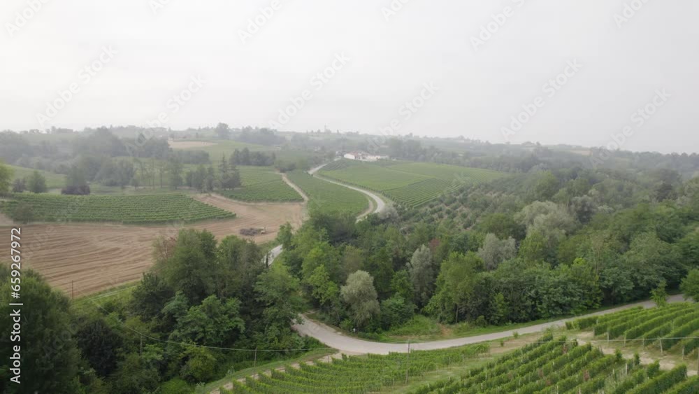 Aerial Shot Of a Small Village in Countryside Surrounded by Vineyard and Farmland Aerial Shot Of a Small Village in Countryside Surrounded by Vineyard and Farmland