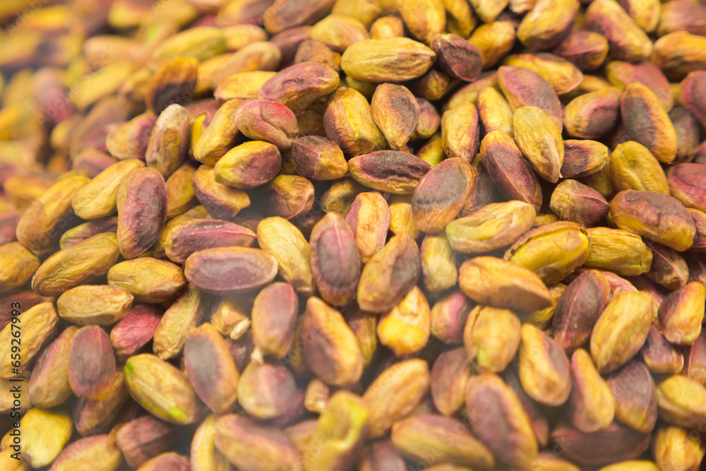 Pistachio kernel nuts background closeup Pistachio kernel nuts background closeup