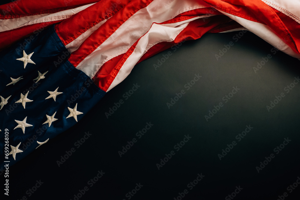 Celebrate Veterans Day with a close-up of American flags against a blackboard. A symbol of national pride and democratic freedom is.