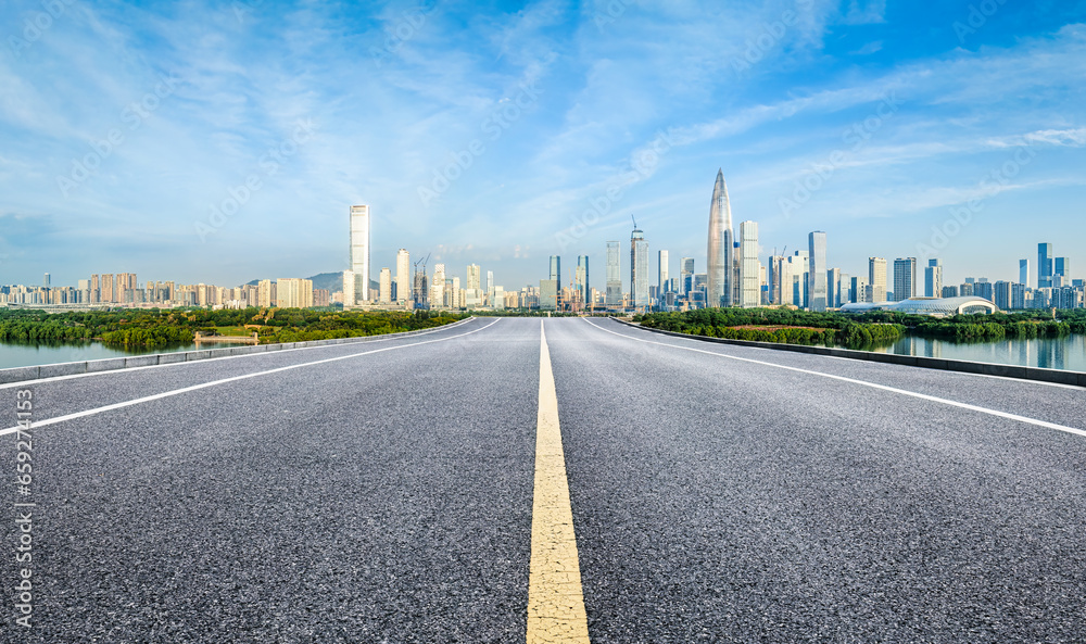 Fototapeta premium Shenzhen city skyline and asphalt road background