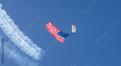 American Flag parachute demonstration at an airshow  photo