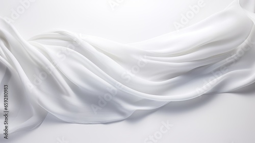 White silk fabric draped in a wave-like pattern.a smooth and flowing white silk fabric that creates a gentle curve. The fabric has a soft texture and a bright color that contrasts with the plain white photo