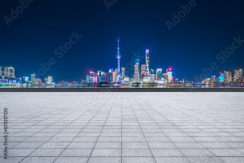 financial district buildings of shanghai and empty floor at night