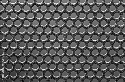 Macro photography of metal grid background.