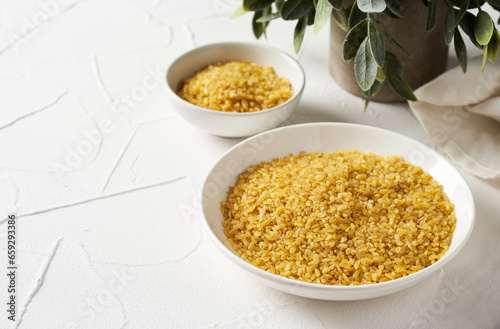 Obraz na plátně bulgur durum wheat on white table background