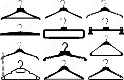 Collection of different coat hangers isolated on white