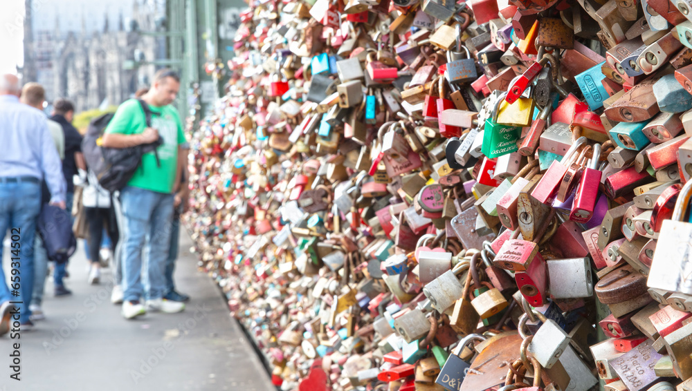 Cologne, Germany on september 30, 2023: Love Locks on the Hohenzollern Bridge over the Rhine, Busiest Railway Bridge in Germany Cologne, Germany on september 30, 2023: Love Locks on the Hohenzollern Bridge over the Rhine, Busiest Railway Bridge in Germany