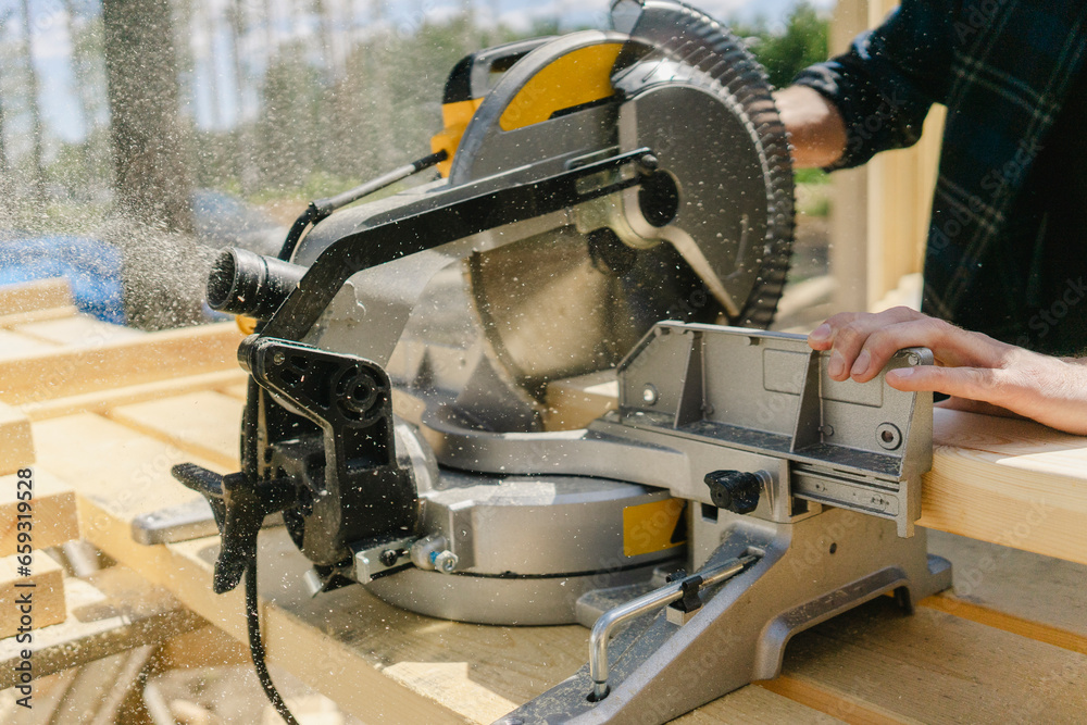Construction worker working with equipment at construction site