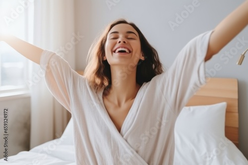 Woman stretching in bed after wake up, AI Generated photo