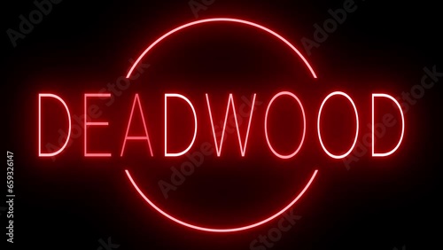 Flickering red retro style neon sign glowing against a black background