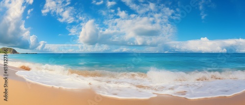 Summer Bliss: Beautiful Natural Panoramic Seascape Featuring a Golden Sandy Beach, Turquoise Sea, and Blue Sky with Clouds on a Bright Sunny Day