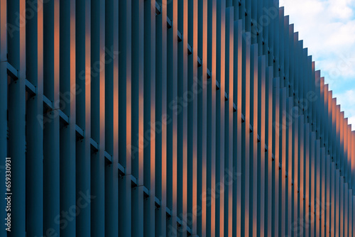 Modern metallic facade, architectural feature with stripped pattern