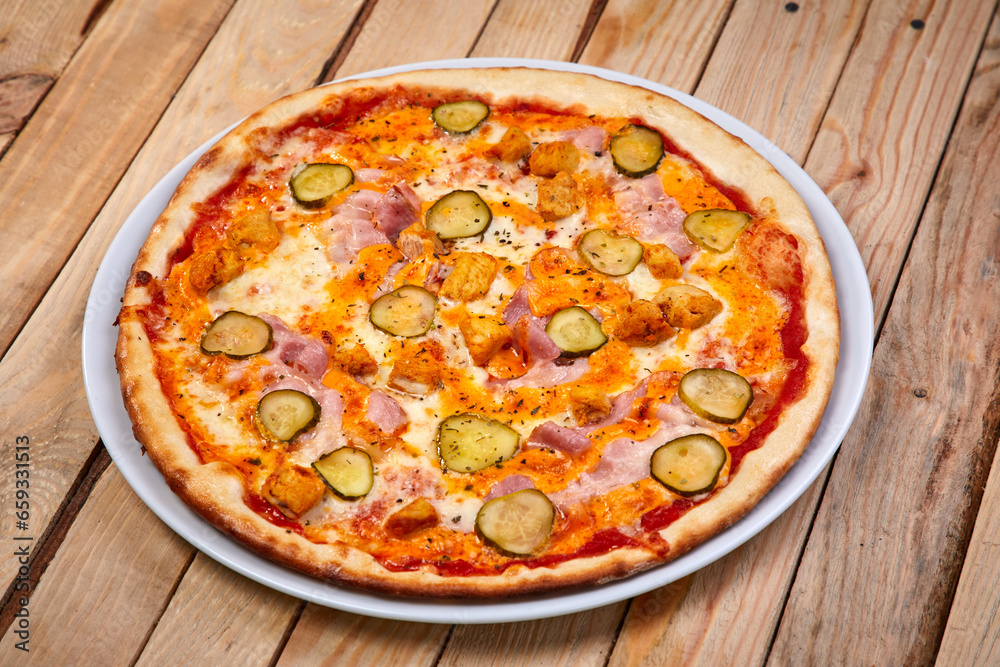 tasty pizza on the wooden background