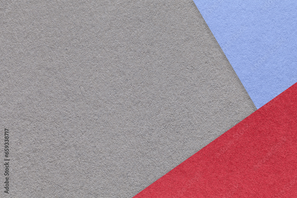 Texture of craft gray color paper background with red and blue border. Vintage abstract grey cardboard. Texture of craft gray color paper background with red and blue border. Vintage abstract grey cardboard.