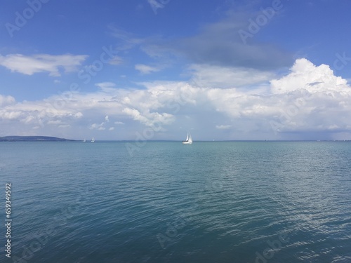 White sailboat in lake Balaton