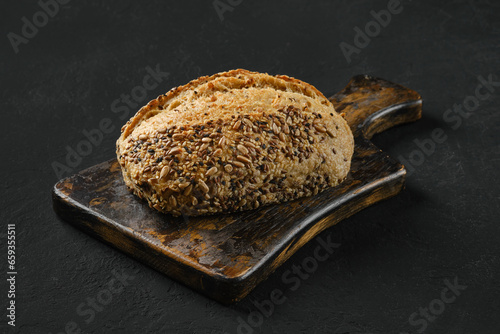 Whole loaf of artisan bread with sunflower seeds