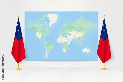 World Map between two hanging flags of Samoa flag stand.