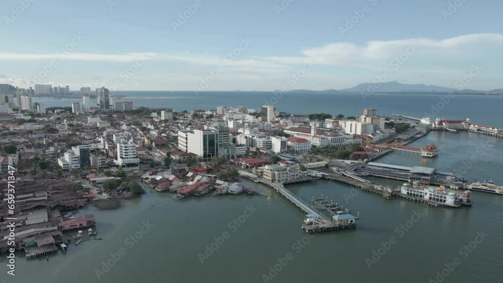 Aerial pans across ferry terminals at George Town, Penang, Malaysia Aerial pans across ferry terminals at George Town, Penang, Malaysia