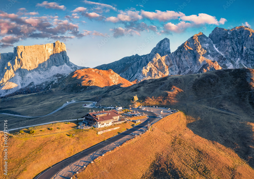 View from flying drone of Dolomite Alps. Rocky evening scene of Giau pass, province of Belluno in Italy, Europe. Spectacular autumn landscape of mountain plateau. Traveling concept background.