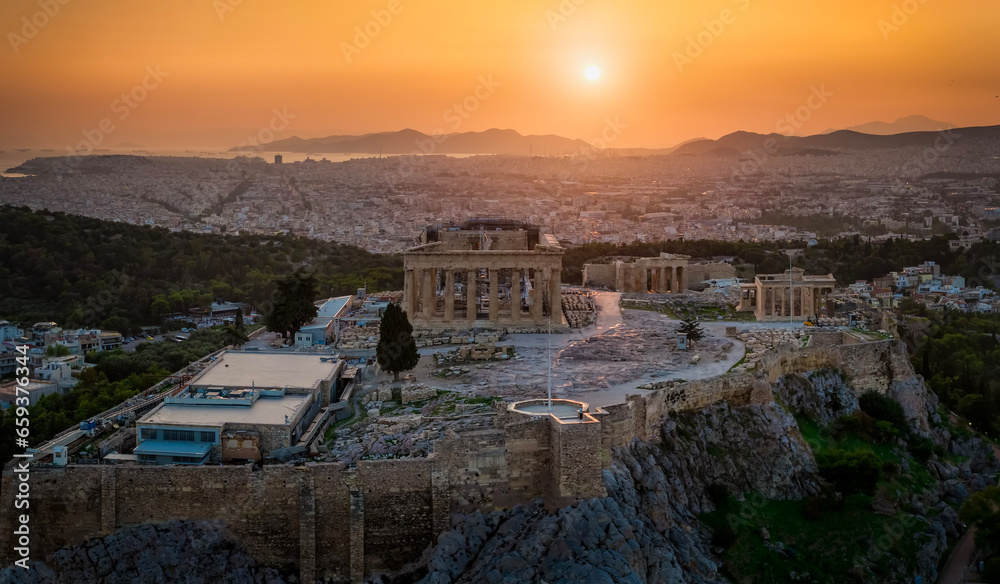 Closeup view of the ancient Parthenon Temple at the Acropolis of Athens, Greece, during golden sunset time