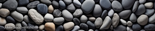 gray stone pebbles edge to edge background. photo