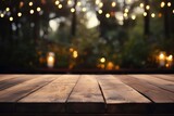 The empty wooden table top with blur background.