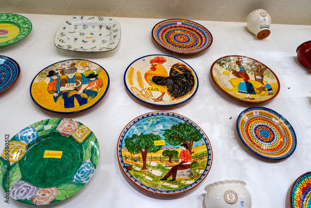 Fototapeta premium Traditional portuguese earthenware cups, bowls and others from varnished baked clay in Lagos, Portugal