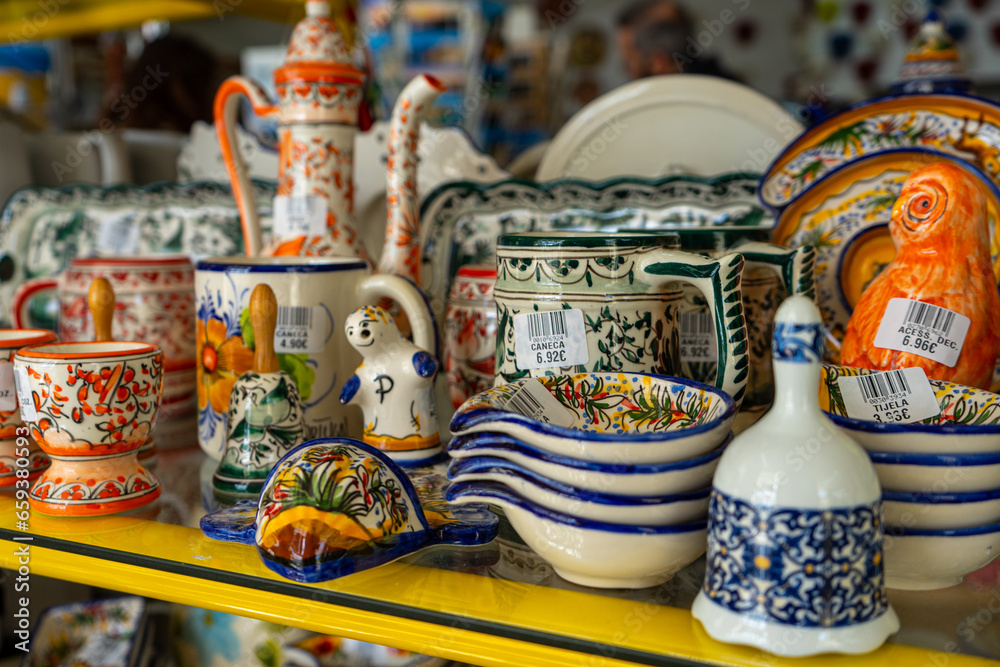 Traditional portuguese earthenware cups, bowls and others from varnished baked clay in Lagos, Portugal 