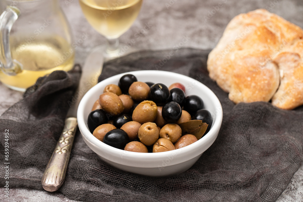 green and brawn salted olives in bowl green and brawn salted olives in bowl